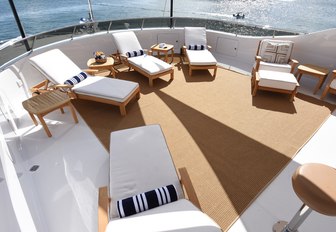 Sun loungers on foredeck of REBEL