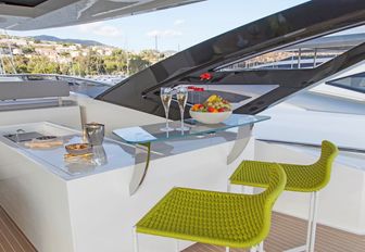 Charter yacht SEATALY exterior seating with champagne glasses