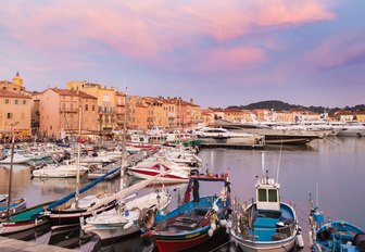 Yachts in the harbour at St Tropez during sunset