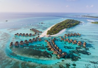 bungalows in the maldives, with little island 