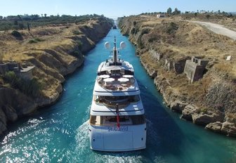 motor yacht St David cruising through the Corinth Canal on a Greece yacht charter