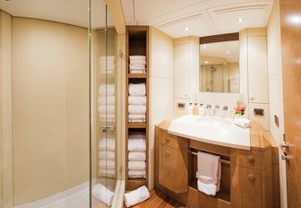 one of the his and her bathrooms on board motor yacht Benita Blue 