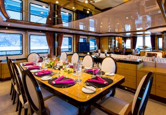 formal dining area in the main salon aboard charter yacht DIANE