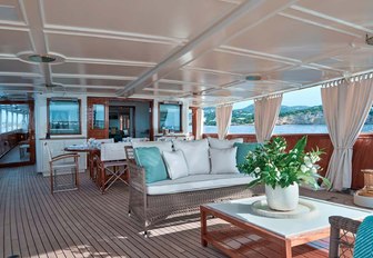 Alfresco living space on aft deck of charter yacht Haida 1929