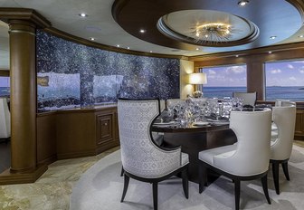 Makassar ebony dining table in the main salon aboard superyacht M3