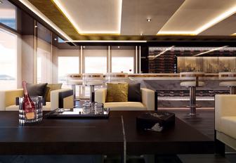 bar and seating area in the skylounge aboard motor yacht Illusion Plus