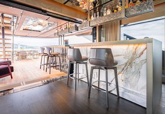 Superyacht charter RAJA² wet bar with stools