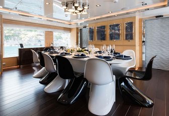 modern dining area in the main salon aboard superyacht RESILIENCE 