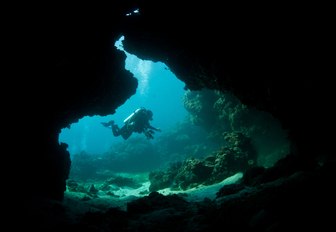 a diver explores the waters during a charter vacation
