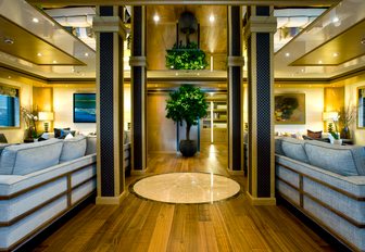 two seating areas in main salon aboard luxury yacht ‘Indian Empress’ 