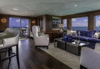 bar and seating area in the skylounge aboard motor yacht M3