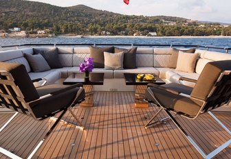 sumptuous seating on the main deck aft of charter yacht AURELIA