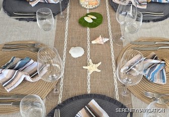 Tablescape of shells and nautical napkins