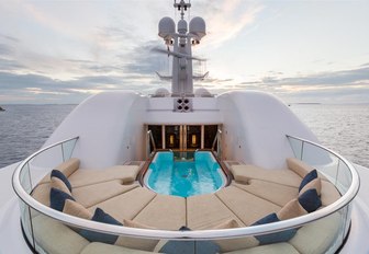 spa pool surrounded by sun pads on the sundeck of luxury yacht WHEELS