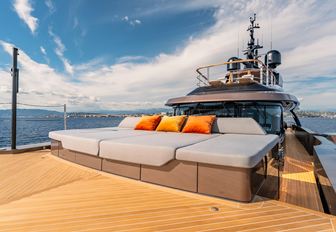 Charter yacht RAJA² sun pads and orange cushions