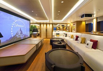 long sofa faces wide-screen TV in the skylounge of motor yacht Mary-Jean II 