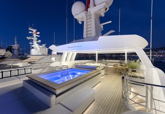 Jacuzzi lights up with LED lights on the sundeck of motor yacht Liquid Sky 