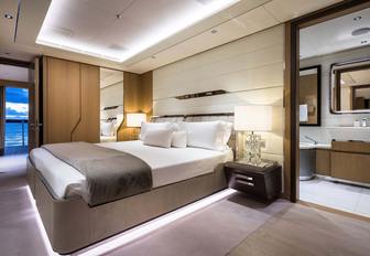 Superyacht charter ARTISAN guest cabin with central berth