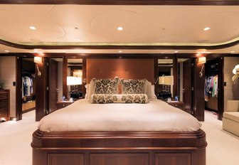 full-beam master suite with large central bed aboard superyacht SAFIRA 