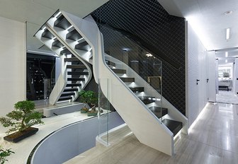 A staircase in the zen zone of motor yacht Ocean Paradise
