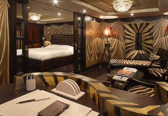 eclectically styled master suite with study and lounge on board luxury yacht DENIKI