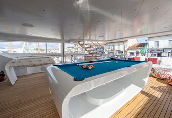 Table football and pool table on superyacht Happy Me