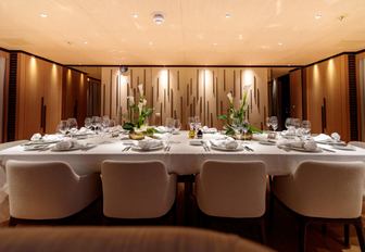 formal dining in the main salon aboard luxury yacht VERTIGE