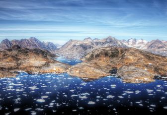 spectacular scenery of mountains and melting ice in Greenland
