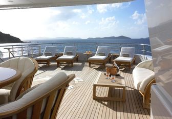 Sun loungers and blues sky aboard superyacht Harle