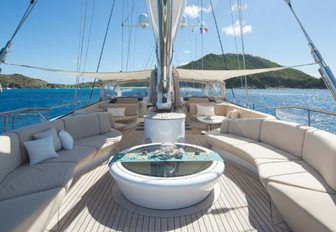 curvaceous seating and coffee table on the sundeck of sailing yacht PANTHALASSA 