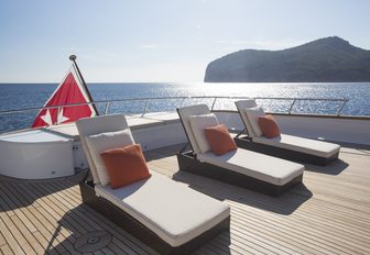 Sun loungers on the aft deck of luxury yacht MQ2