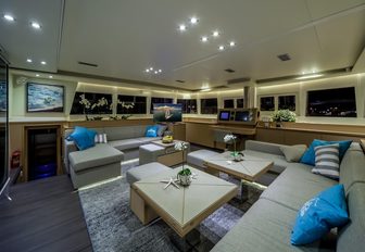 deep sofas in sociable setup in the main salon of luxury yacht Ocean View 