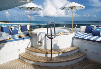 jacuzzi surrounded by sunpads on the sundeck of motor yacht ‘Lady Joy’ 
