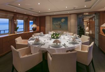 formal dining area in the main salon of luxury yacht L’EQUINOX