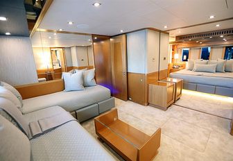 two double cabins convert into one full-beam VIP suite aboard charter yacht SERENITY