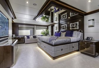 plush master suite with rock 'n' roll photography on board superyacht ‘King Baby’ 