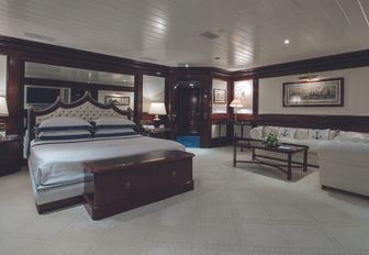 A guest cabin featured on board motor yacht Grand Ocean
