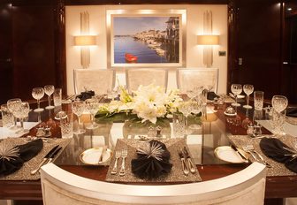 formal dining in the main salon aboard motor yacht TRENDING 