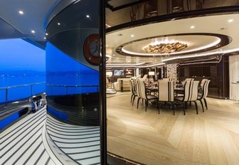 indoor-outdoor dining area on board luxury yacht OKTO 