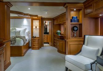 Owner's suite on luxury charter yacht M3, with private lounge area and large bed