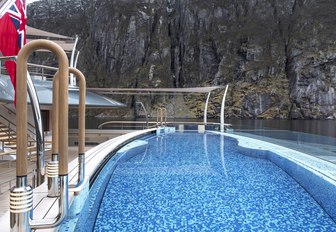 Blue pool on luxury yacht Flying Fox