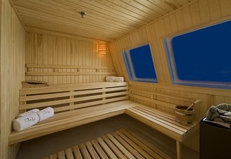 The wooden surroundings of a sauna on board a superyacht