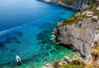 beautiful turquoise waters and rocky coastline of Stara Baska beach, Croatia