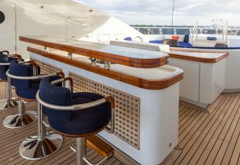 sundeck bar with three stools on board charter yacht Sequel P