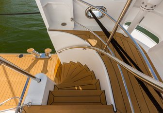 staircase fitted out in teak on board superyacht Game Changer 