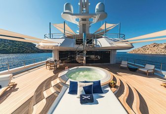 Deck Jacuzzi and sun pad onboard charter yacht PROJECT X