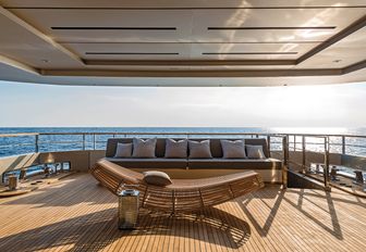 lounge area on shaded aft deck of motor yacht GIRAUD