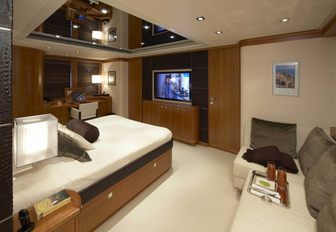 bed in master suite of luxury yacht destiny