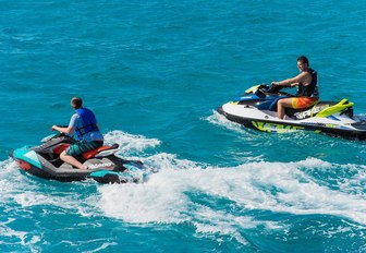 charter guests aboard luxury yacht 'My My My' take to the jet skis