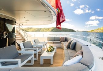 chic seating area on the main deck aft of charter yacht G3